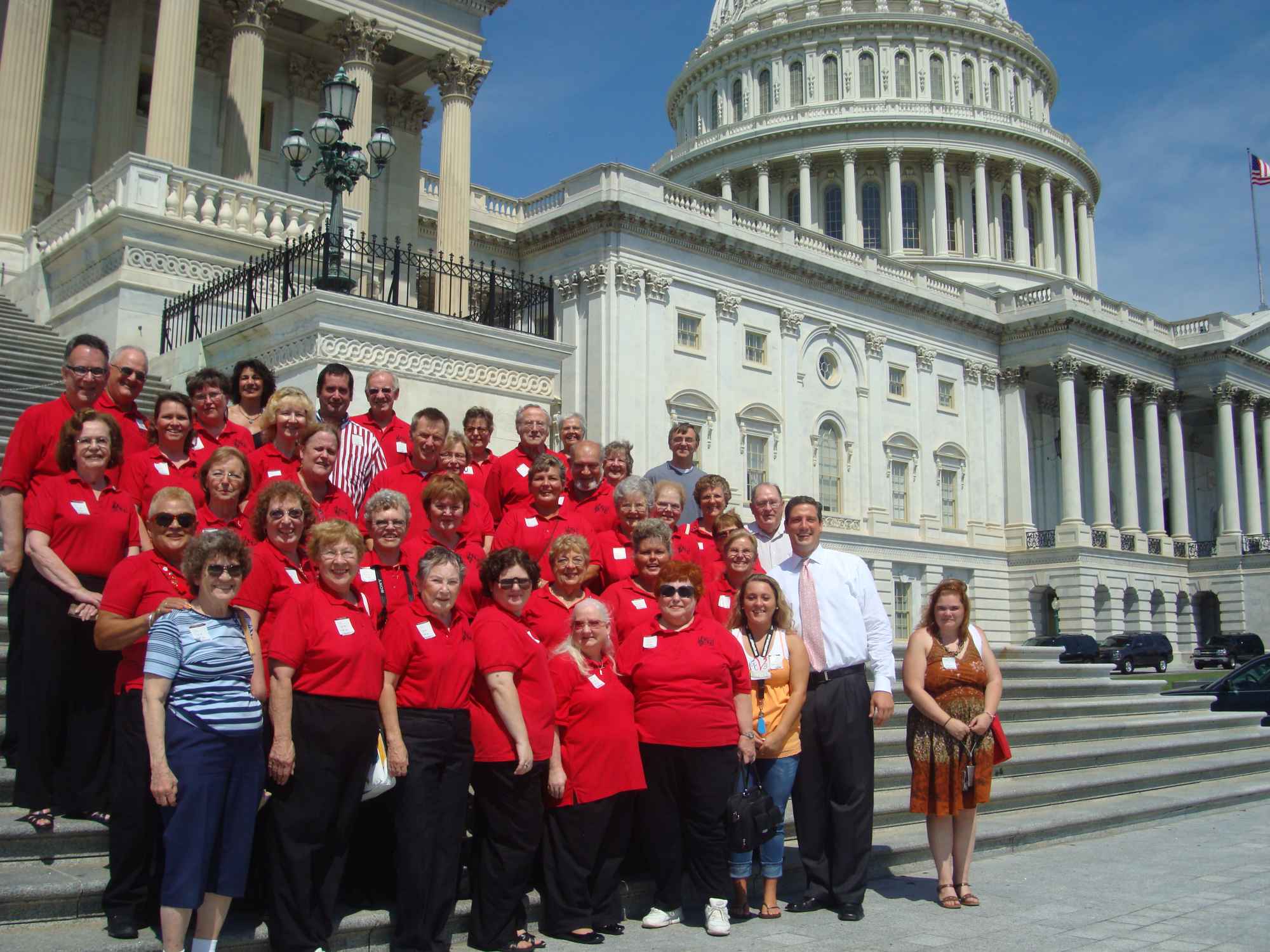 Photo of choir on Capitol steps with Congressman Tim Ryan